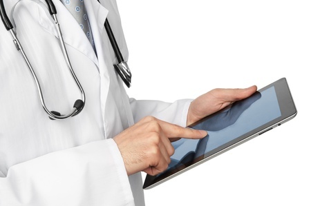 doctor holding an iPad